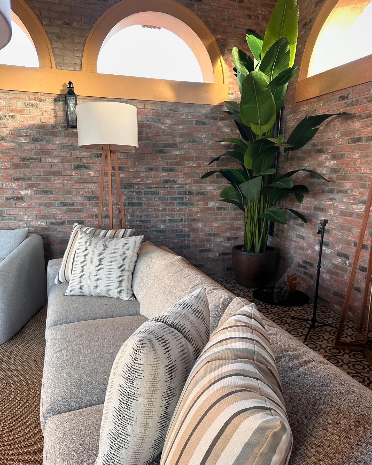 Faux brick lounge with arched windows